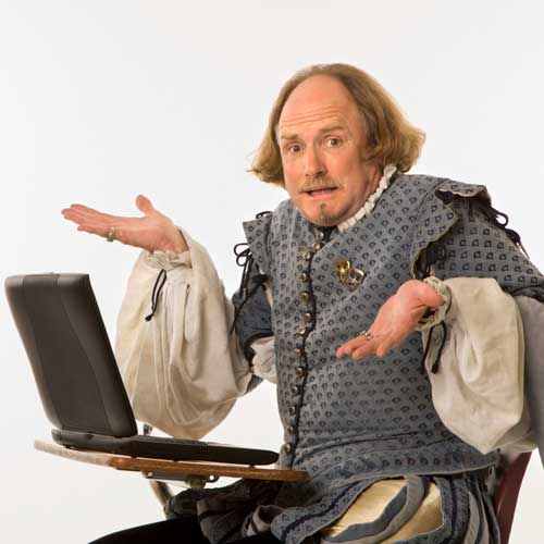 Shakespeare looking confused with a laptop